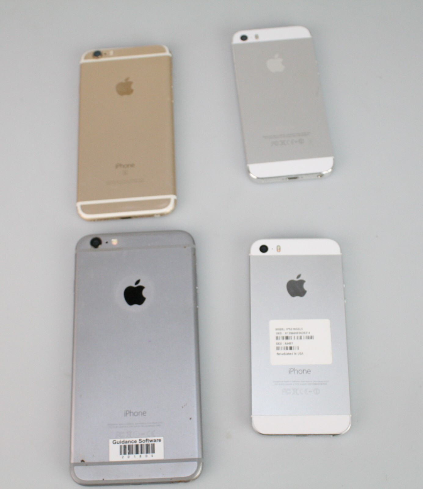 Lot of (4) iPhones A1633, A1522, A1533 – *FOR PARTS OR REPAIR*
