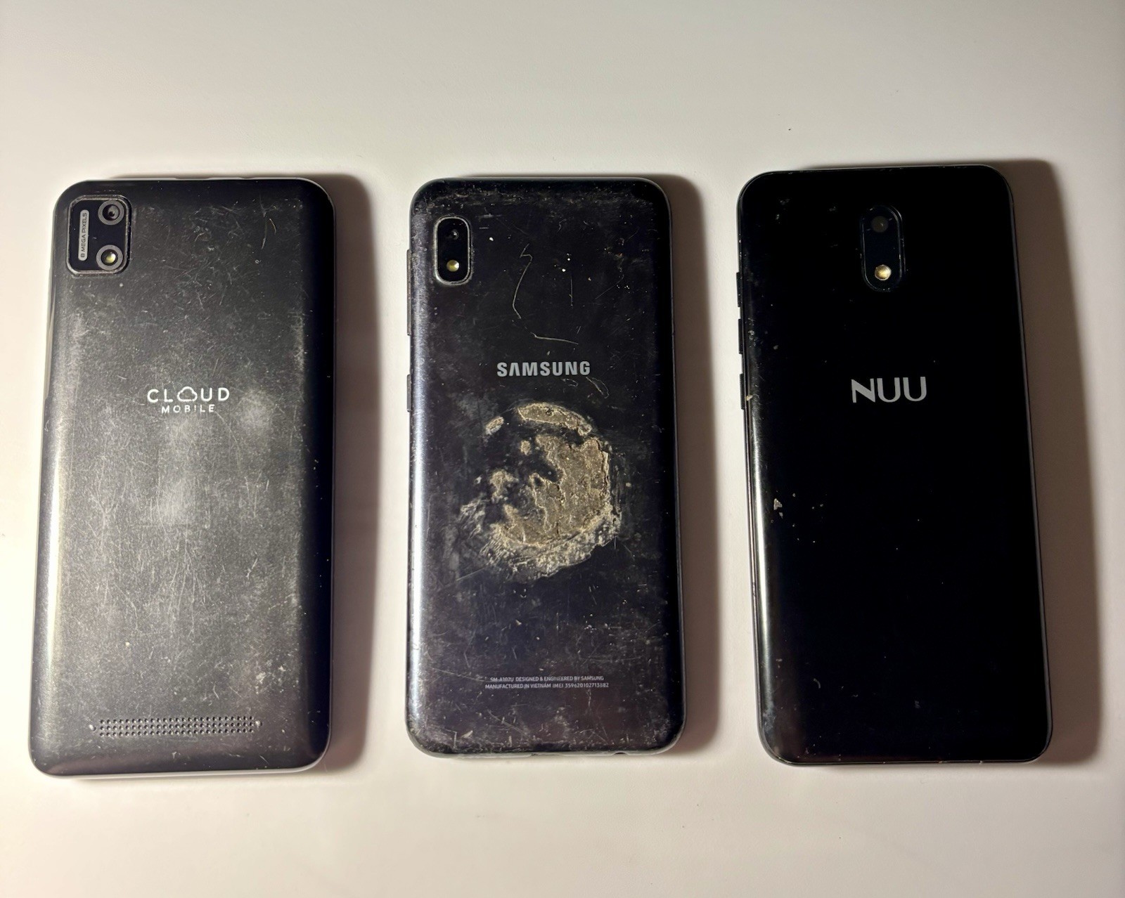 3 Broken Smartphones – Samsung Galaxy A10e, NUU A10L & Stratus C7 – Sold As Is