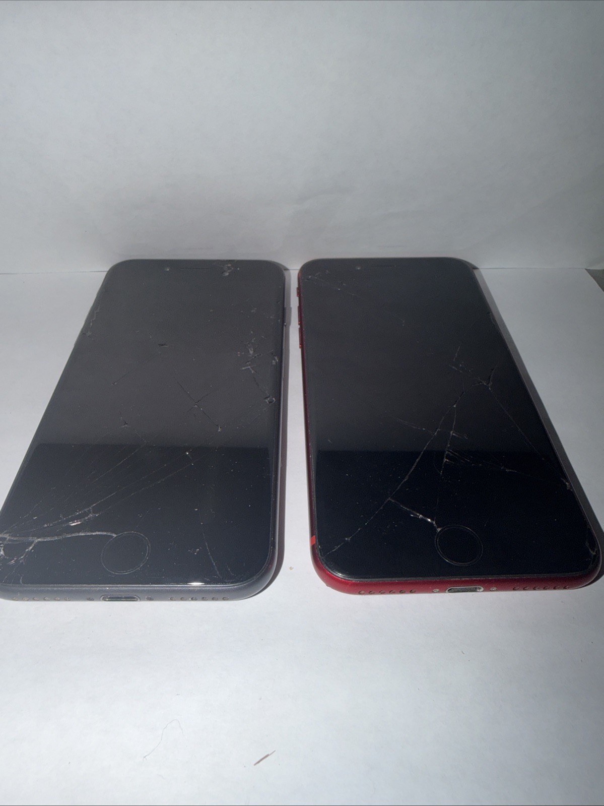 2 iPhone 8s (Product) Red And Black Need To Be Reset