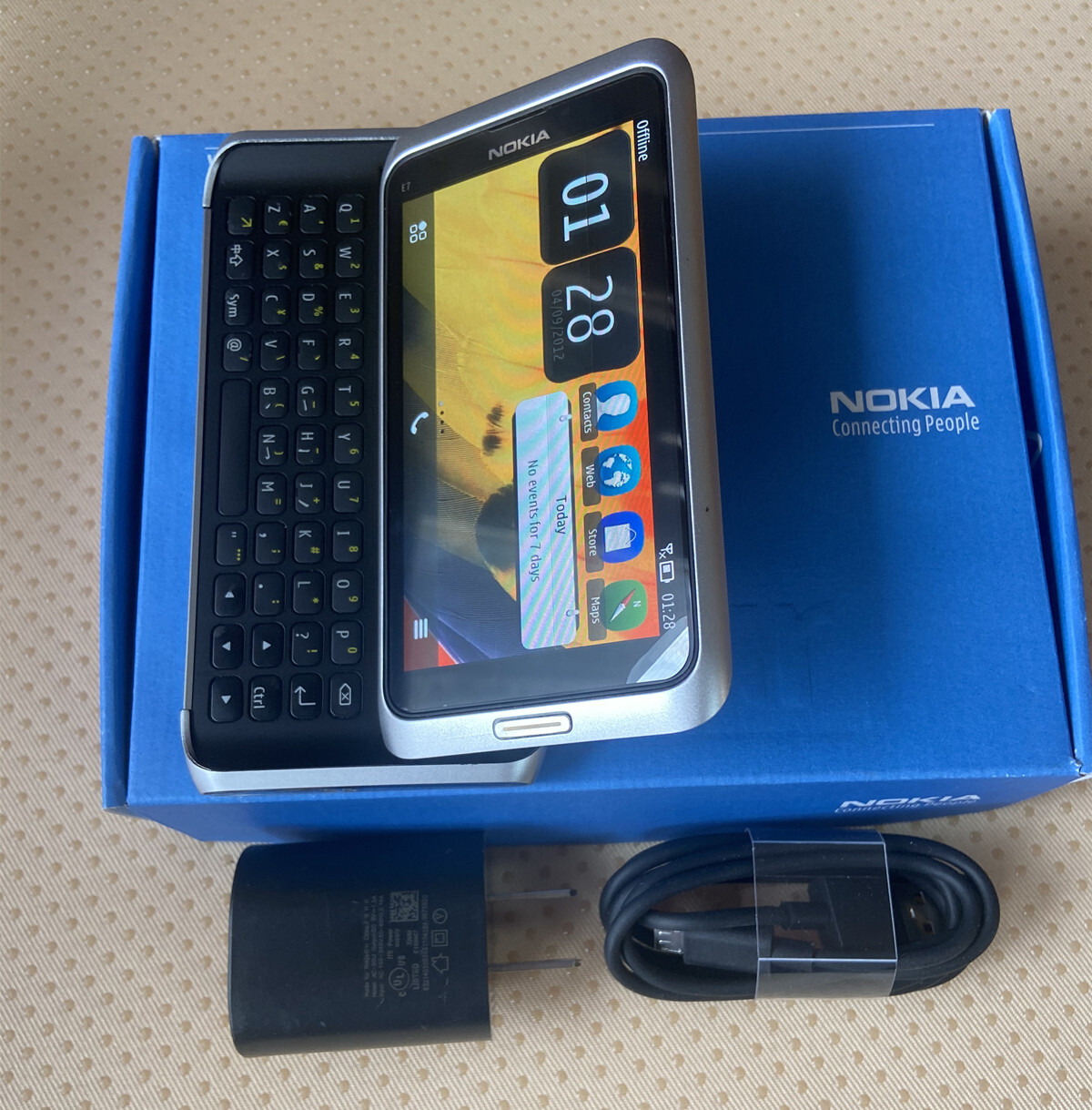 Original Unlocked Nokia E7-00 4″ Touch Screen Slide 16GB 3G Symbian Cell Phone