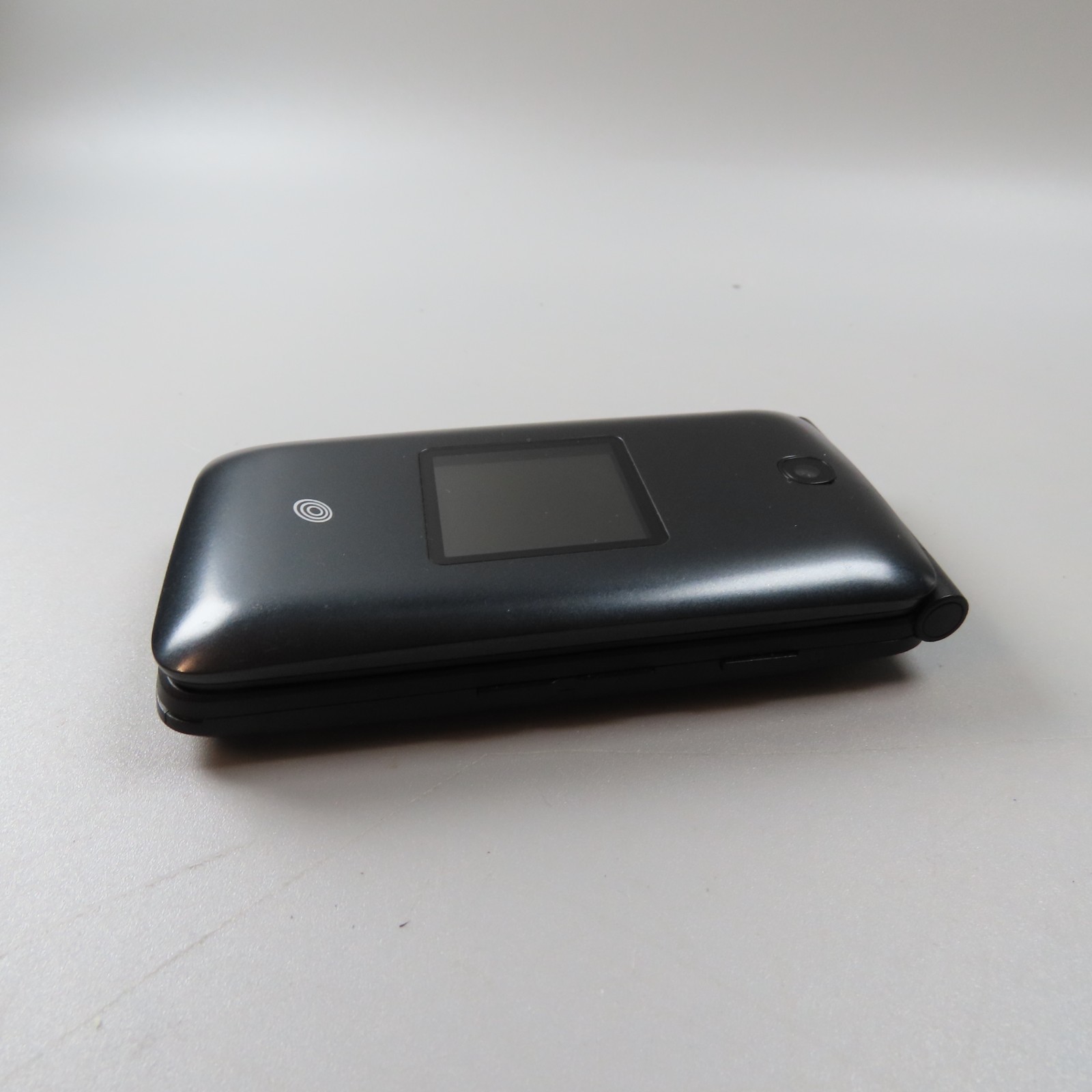 Alcatel A405DL Cellphone- Powers on, buttons are functional, connects to WiFi
