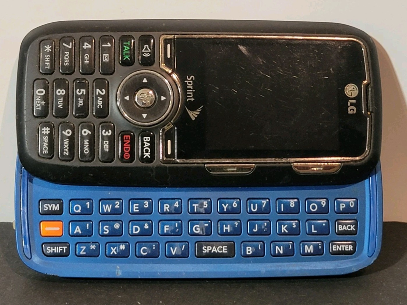LG Rumor LX260 – Black and Blue ( Sprint) Slider Phone Untested