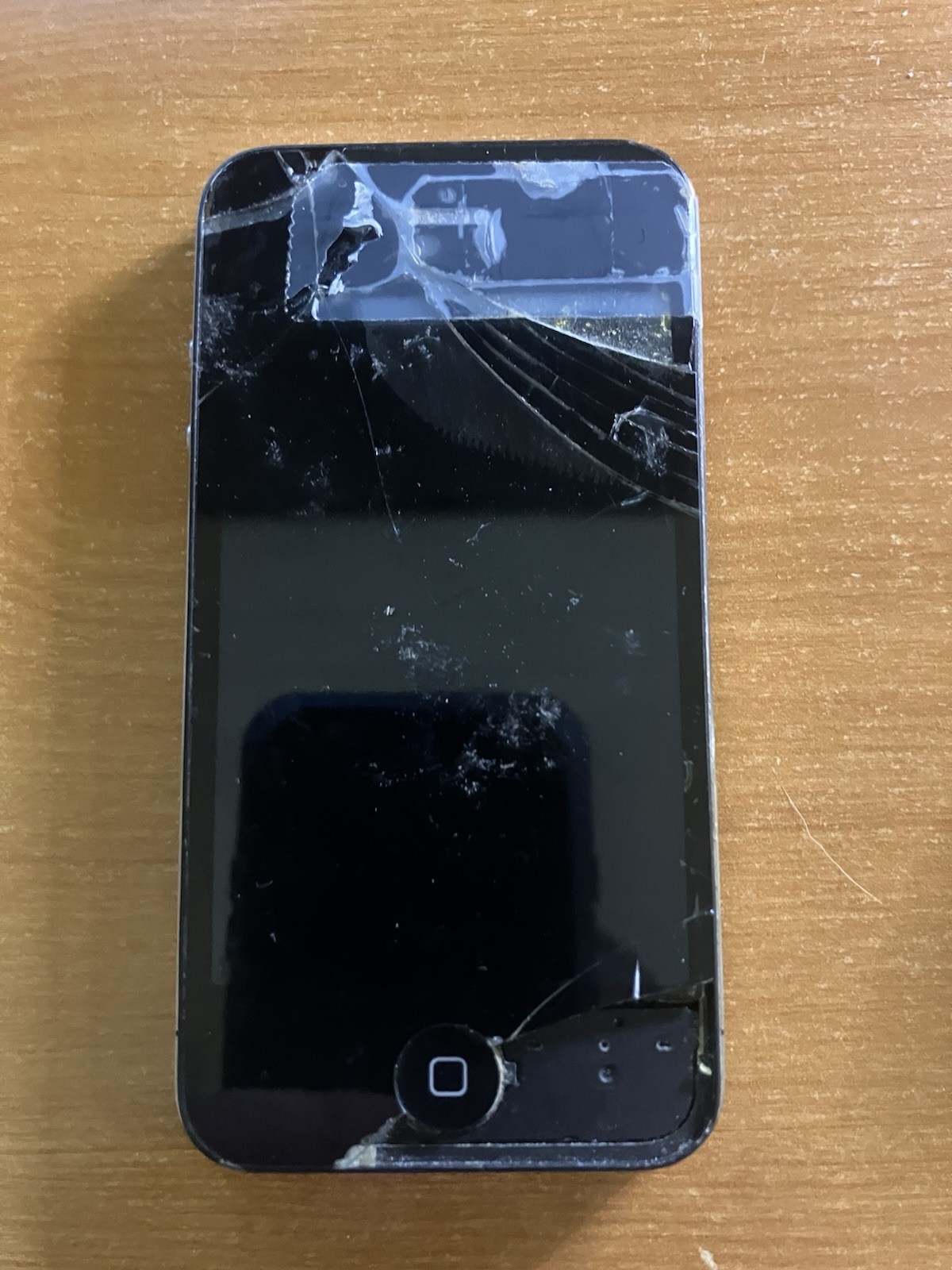 Apple iPhone 4 Parts only! Broken. Vibrates. Will Charge and Power on.
