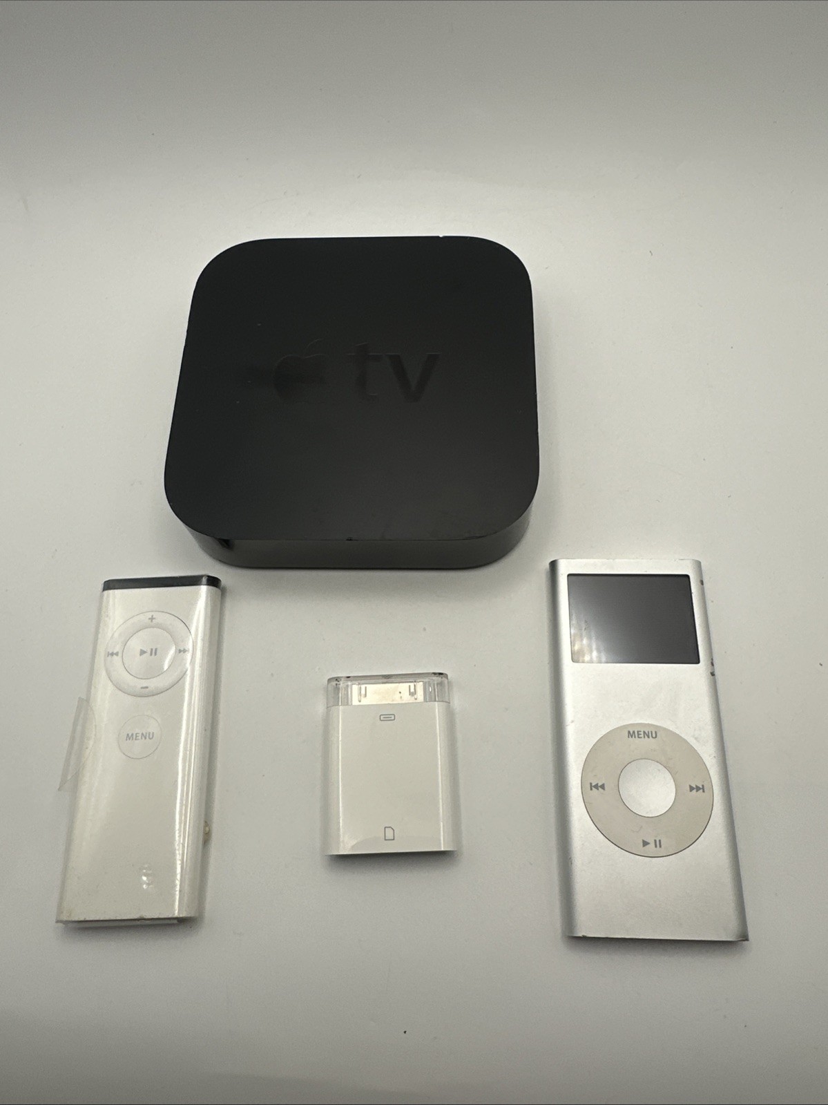 Mixed Lot of 4-Apple TV, Remote, 30 Pin Camera Card iPod 2gb Everything Untested