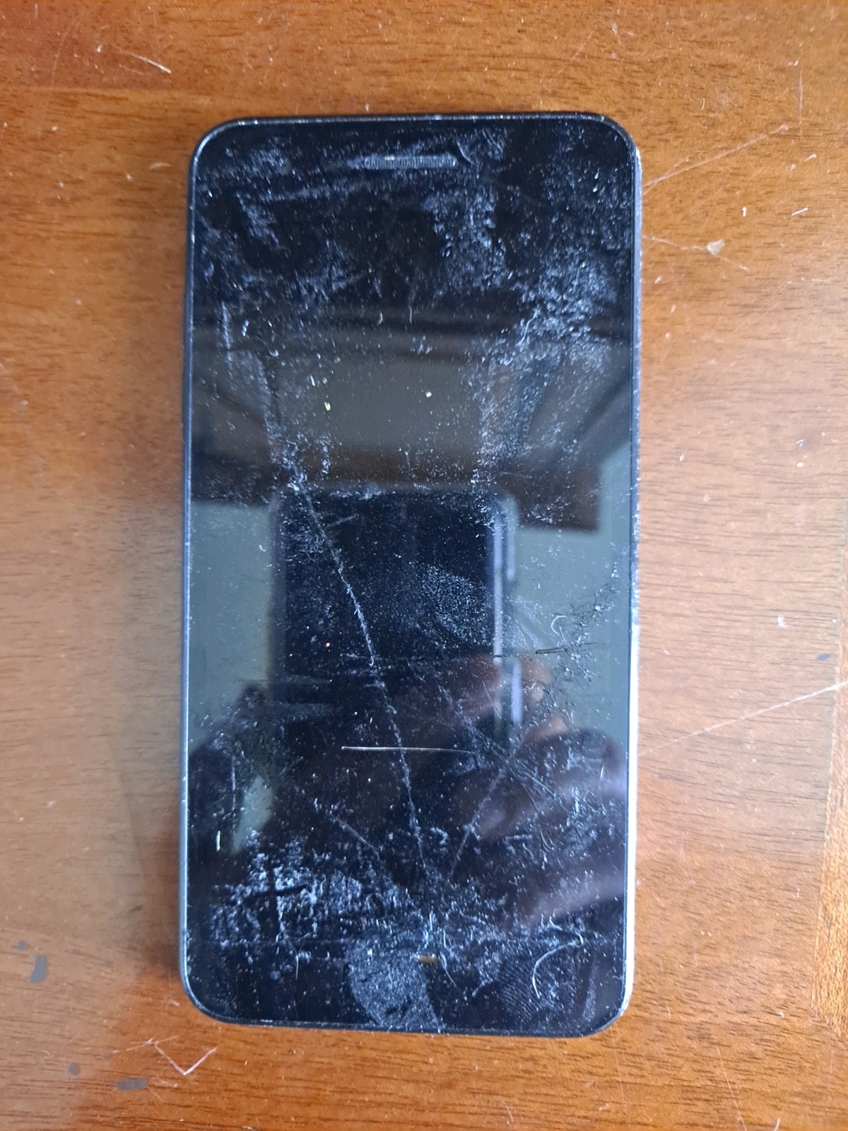 LG Phoenix 4 AT&T Prepaid Smartphone 16gb For Parts Does Not Work