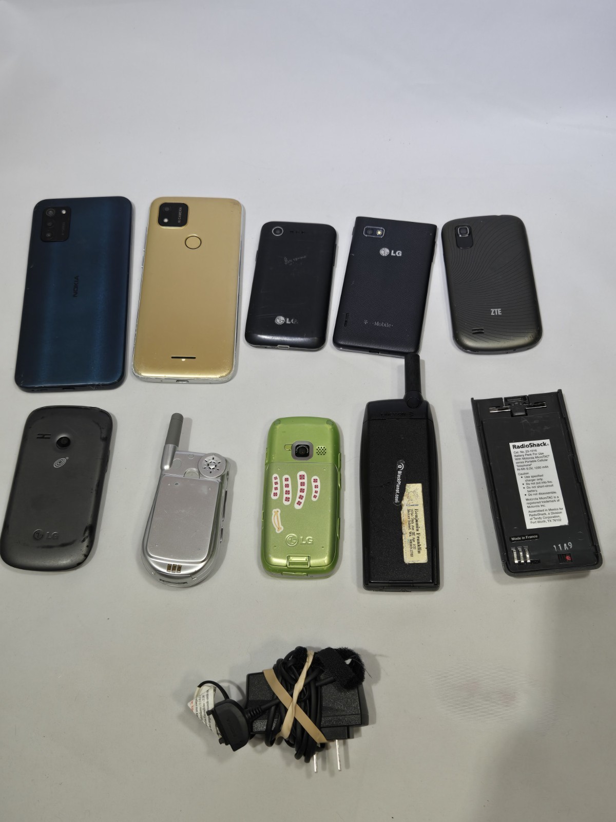 Lot of 9 Mixed Cell Phones & Accessories LG Samsung Ericsson – For Parts