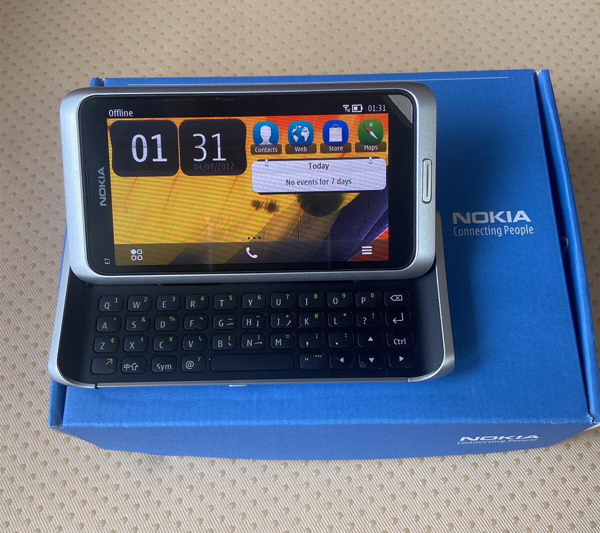 Original Unlocked Nokia E7-00 4″ Touch Screen Slide 16GB 3G Symbian Cell Phone