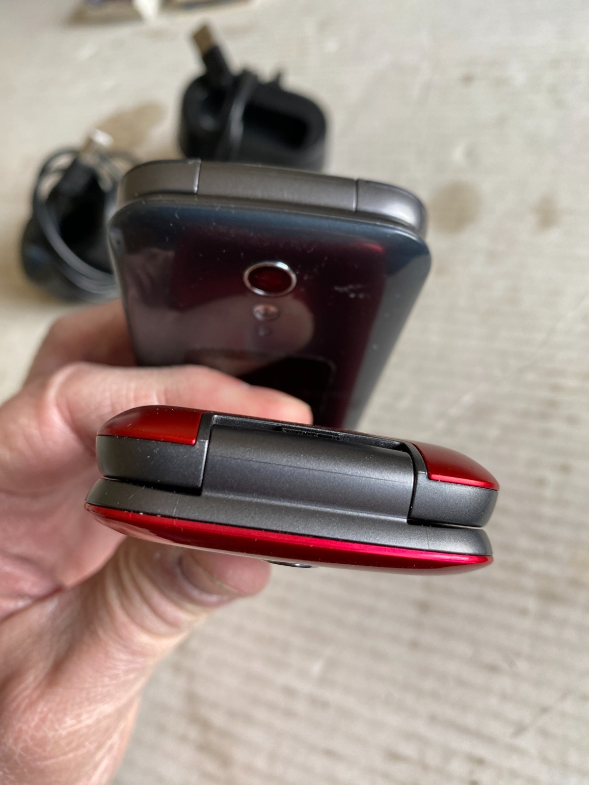 (2) pre-owned Lively Jitterbug flip phones red + gray w/ docking stations