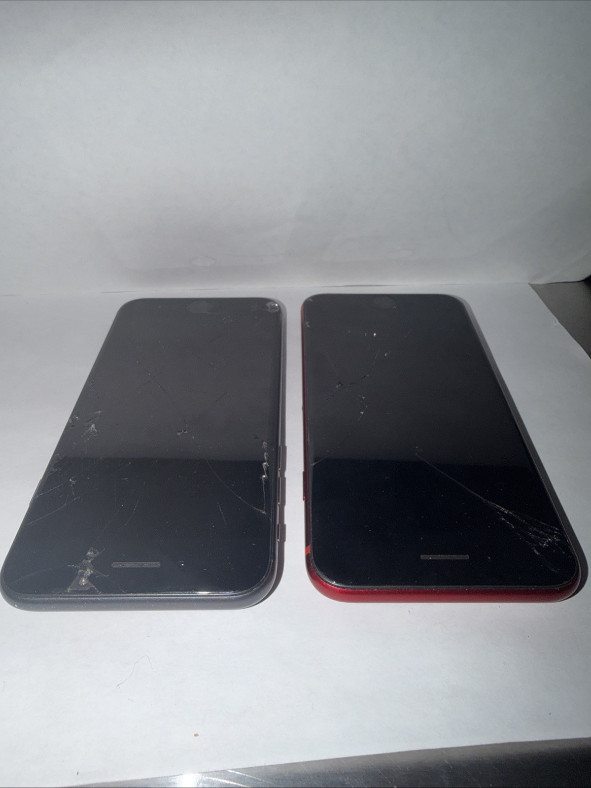 2 iPhone 8s (Product) Red And Black Need To Be Reset