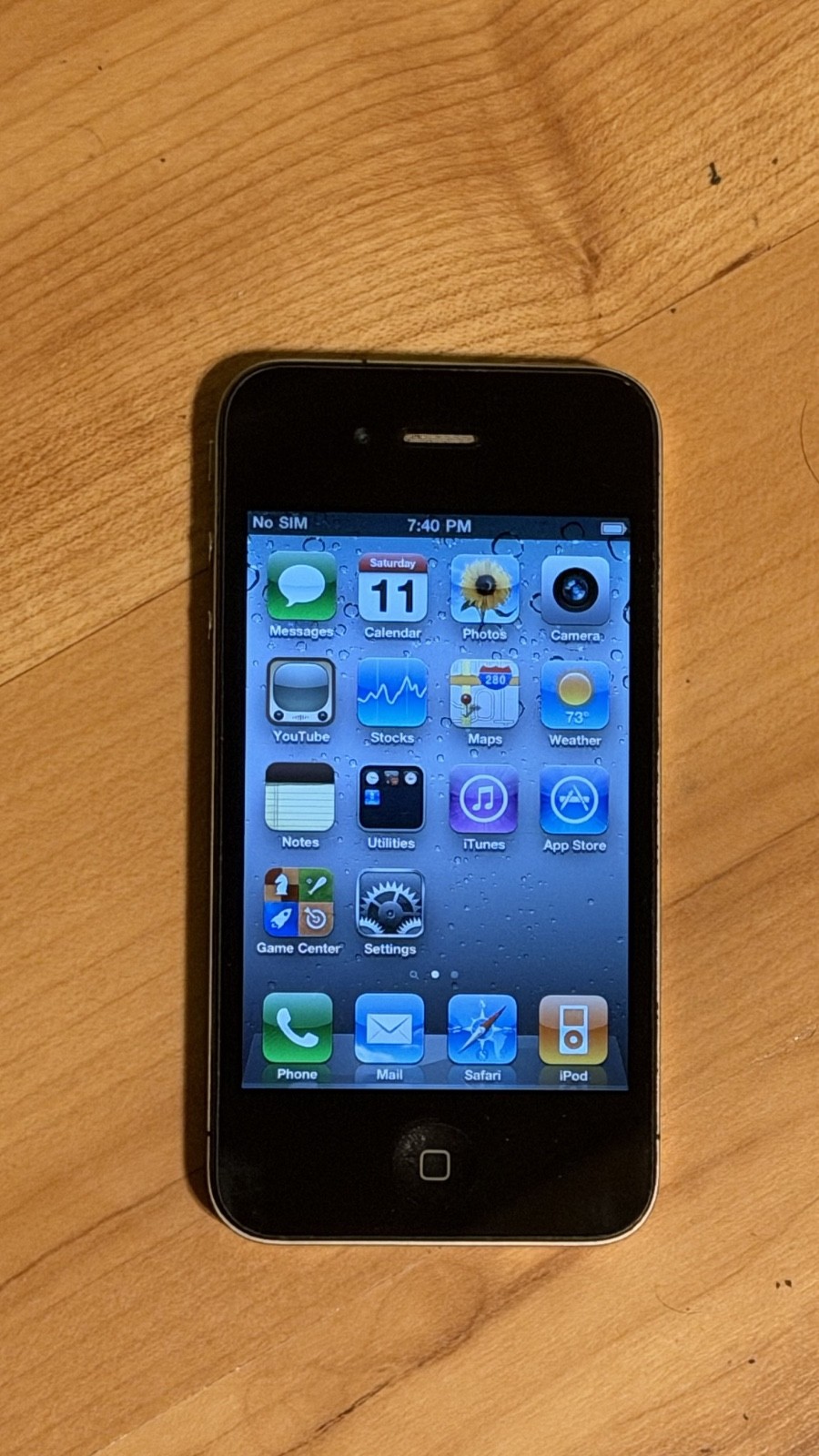 Apple iPhone 4 A1332 16GB Black and Silver Bezel – Used Condition – Working