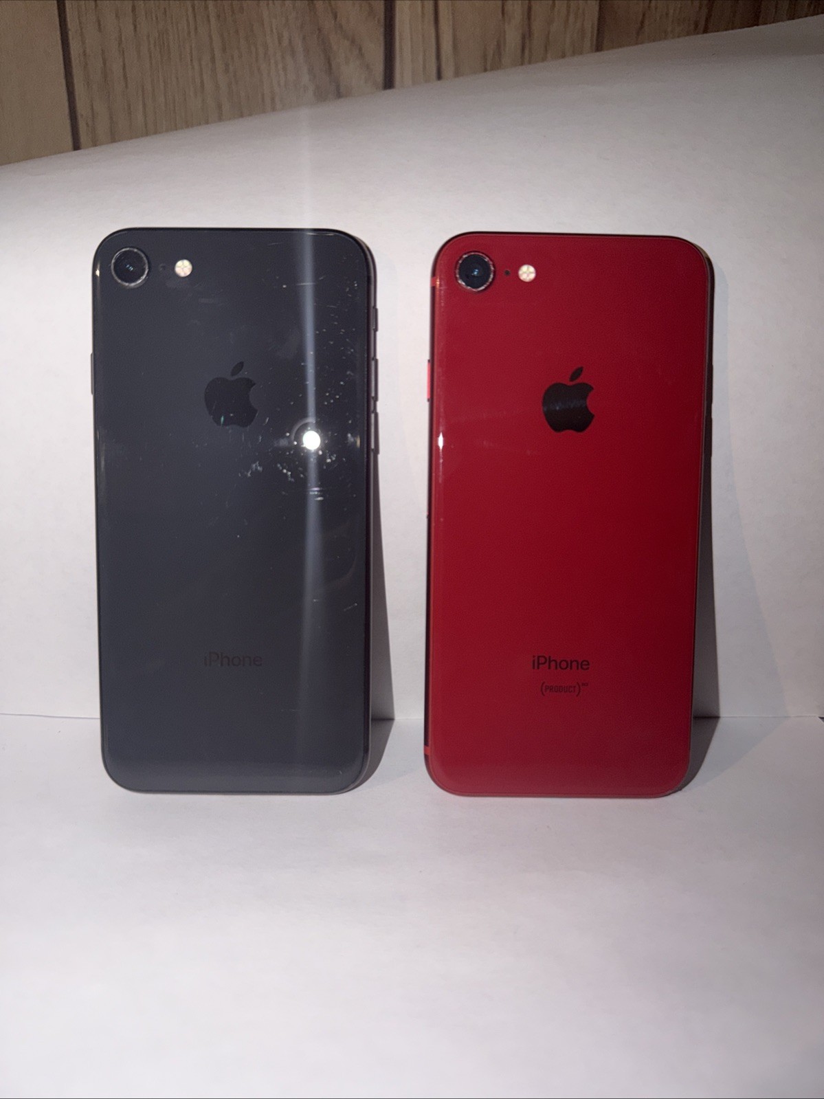 2 iPhone 8s (Product) Red And Black Need To Be Reset