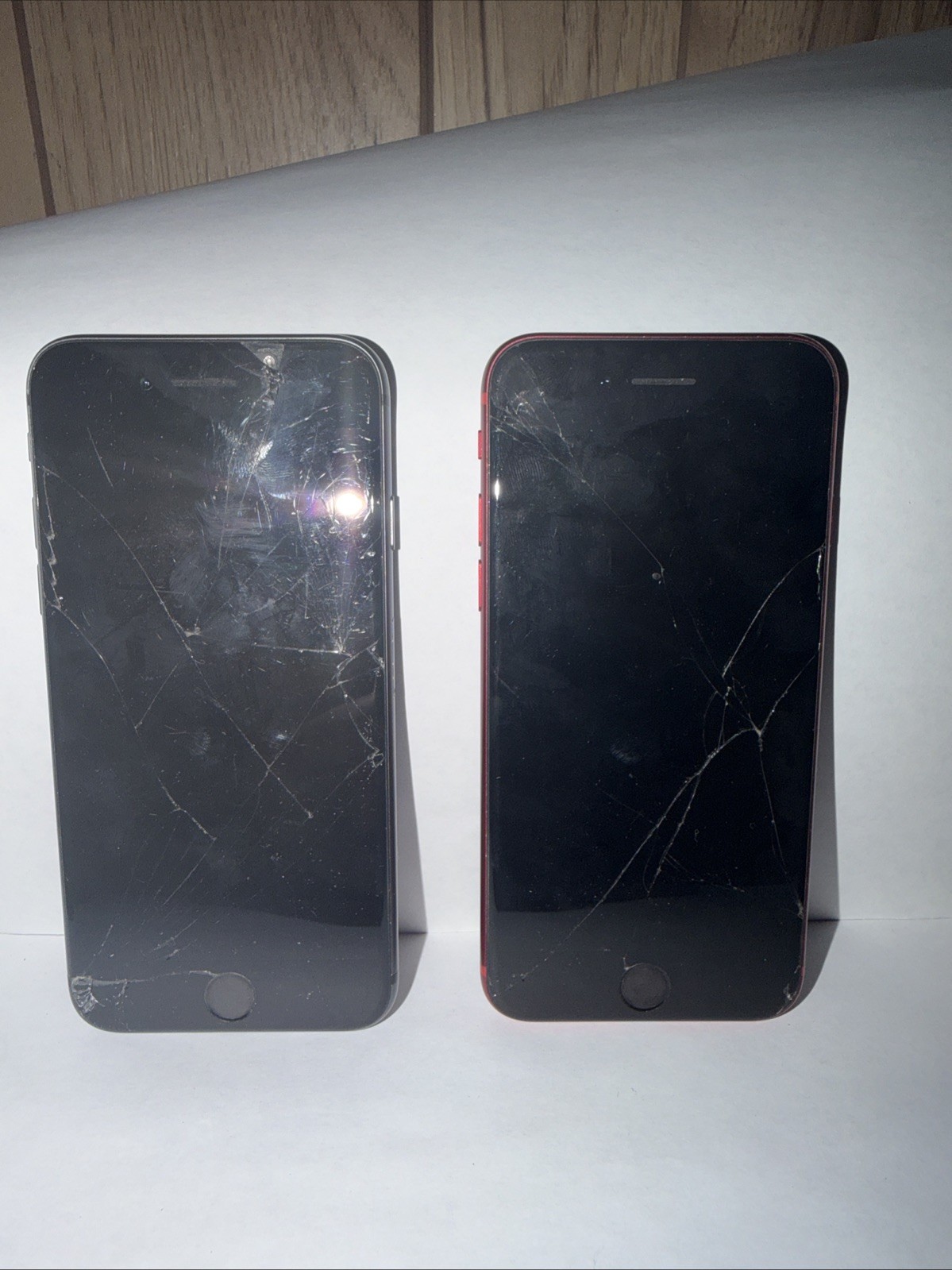 2 iPhone 8s (Product) Red And Black Need To Be Reset