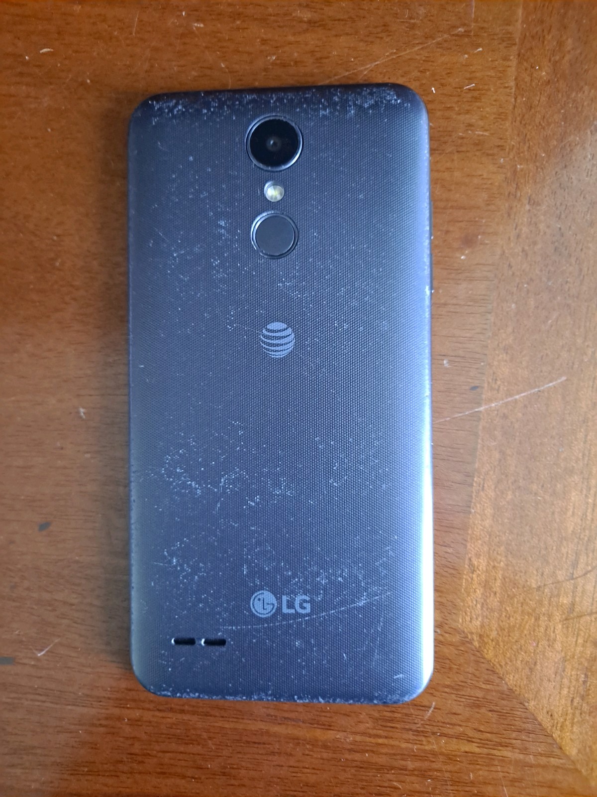 LG Phoenix 4 AT&T Prepaid Smartphone 16gb For Parts Does Not Work