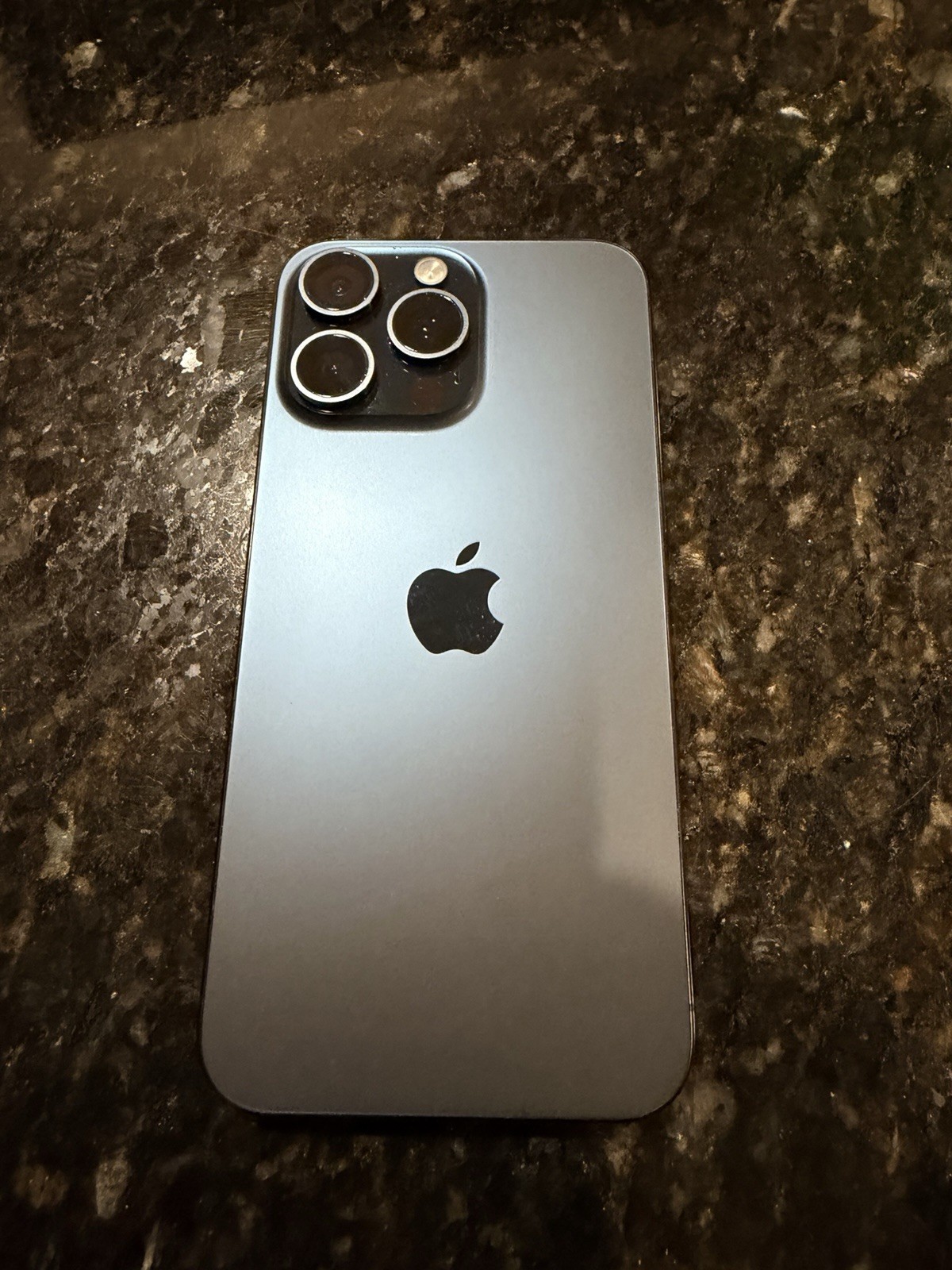 Apple iPhone 15 Pro Gray Bar Style Smartphone with 48MP Rear Camera