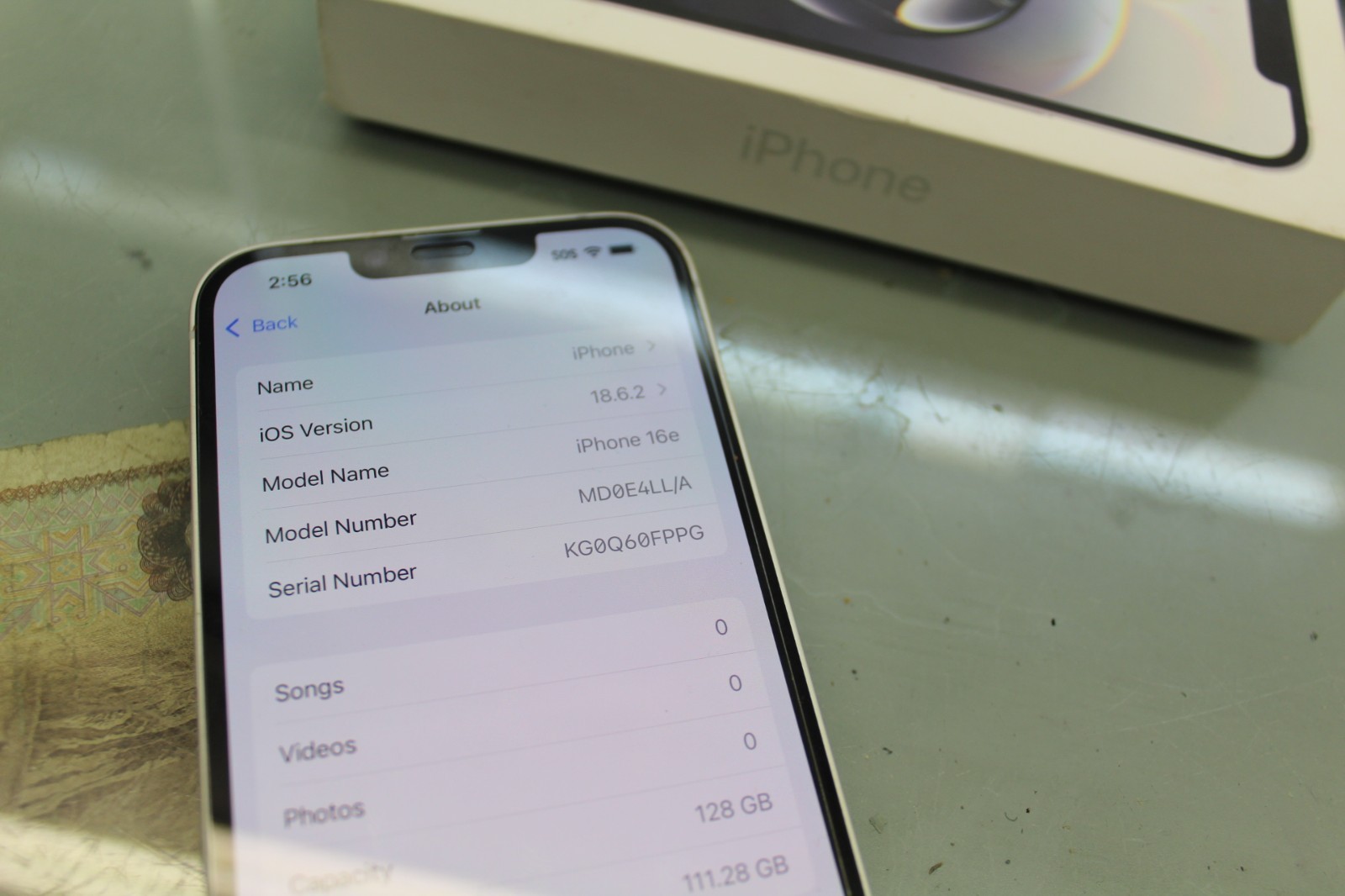 Apple MD0E4LL/A iPhone 16e 128GB – Boost White Smartphone Cycle Count 8