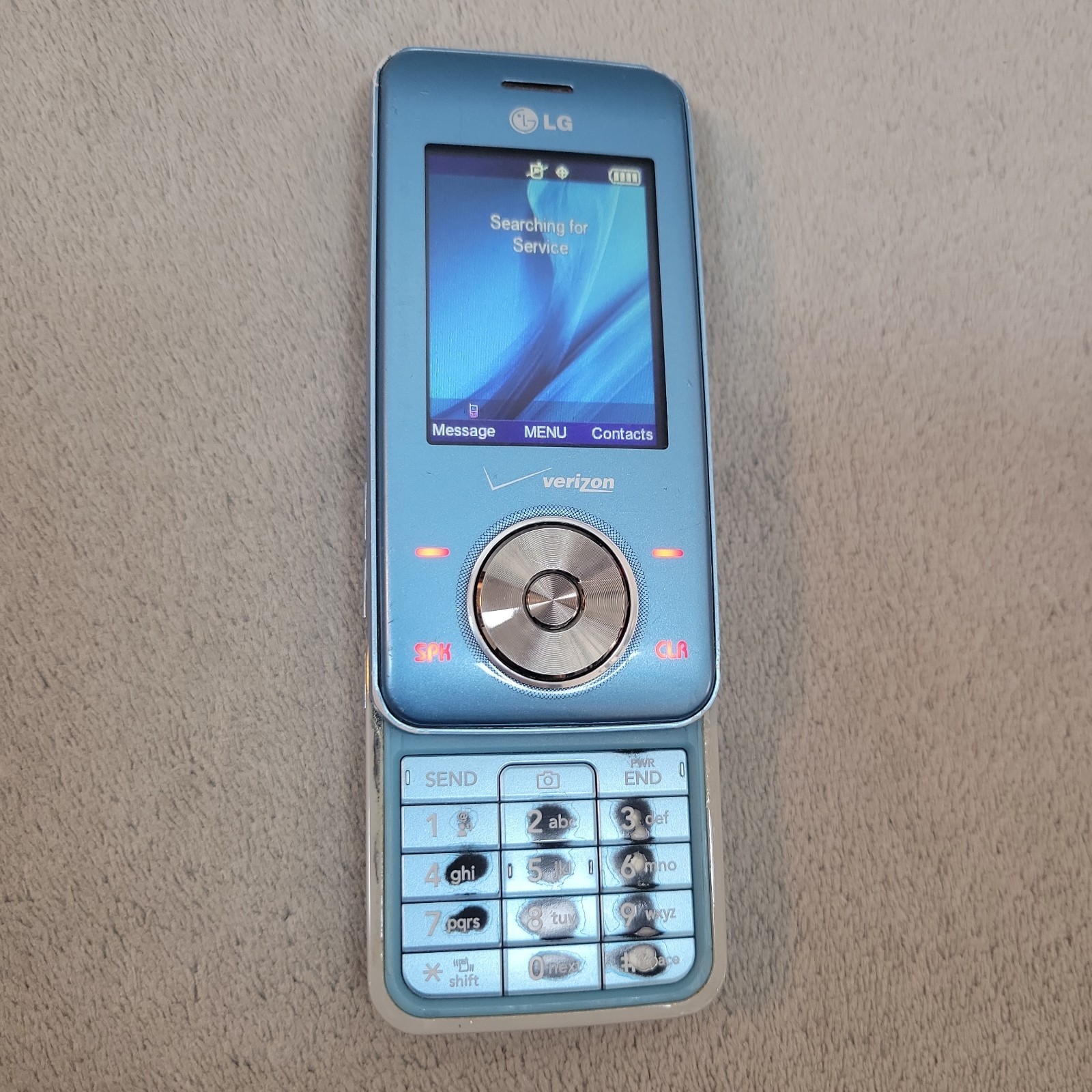 LG Chocolate Spin VX8550A Ice Blue Verizon Cell Phone READ Powers On
