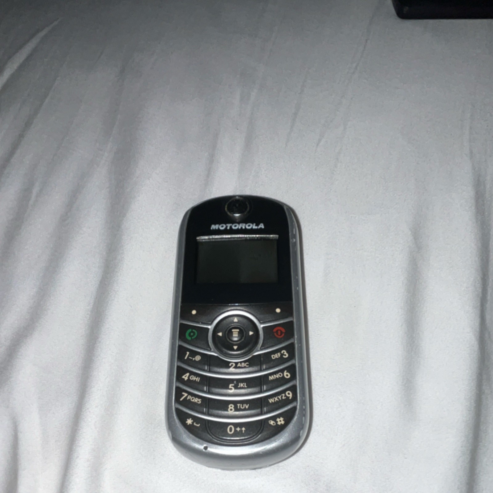Motorola TFC139B 128MB Silver/Black Bar Style TracFone 2G Cell Phone Used