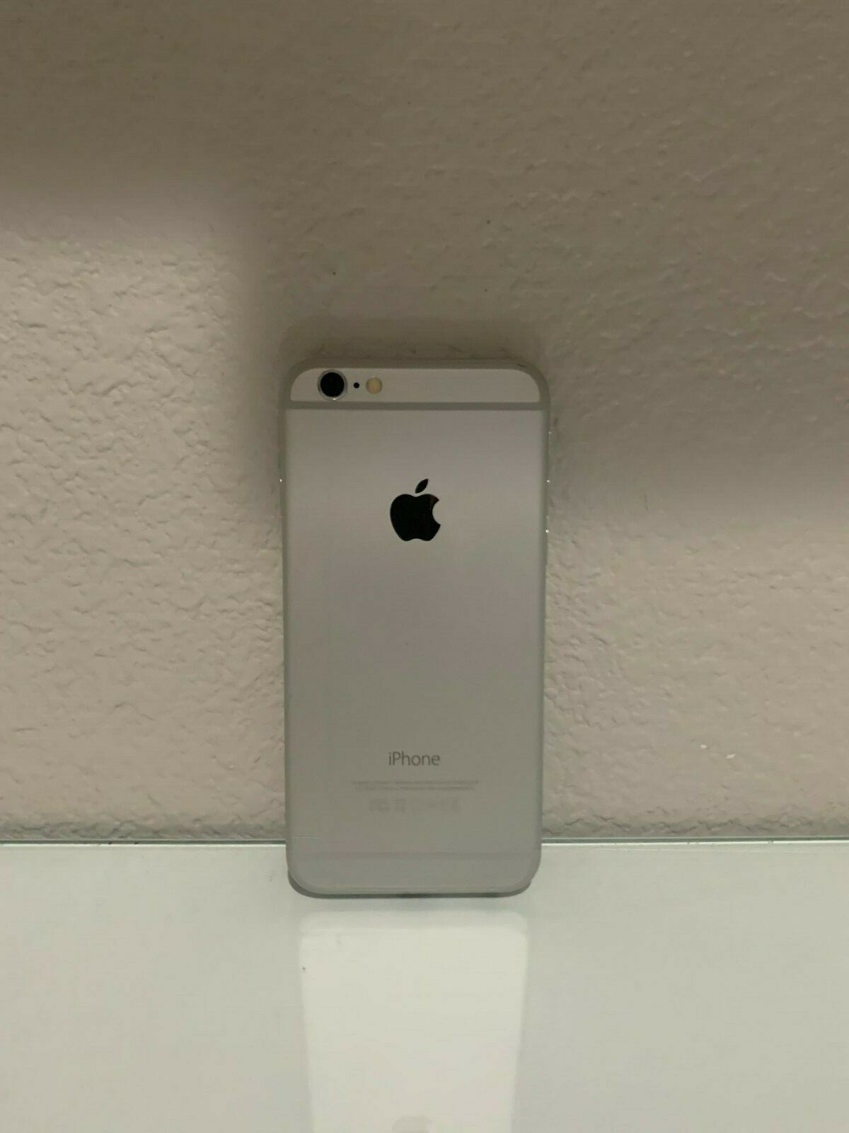 Apple iPhone 6 – 64GB – Silver (Unlocked) A1549 (CDMA + GSM)