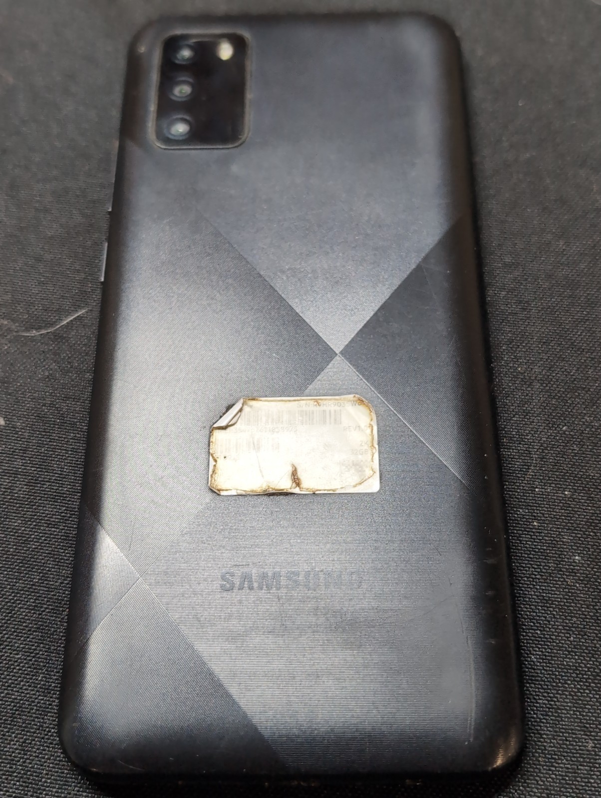 samsung Galaxy A02S Black smart Phone. For parts Only But Powers On