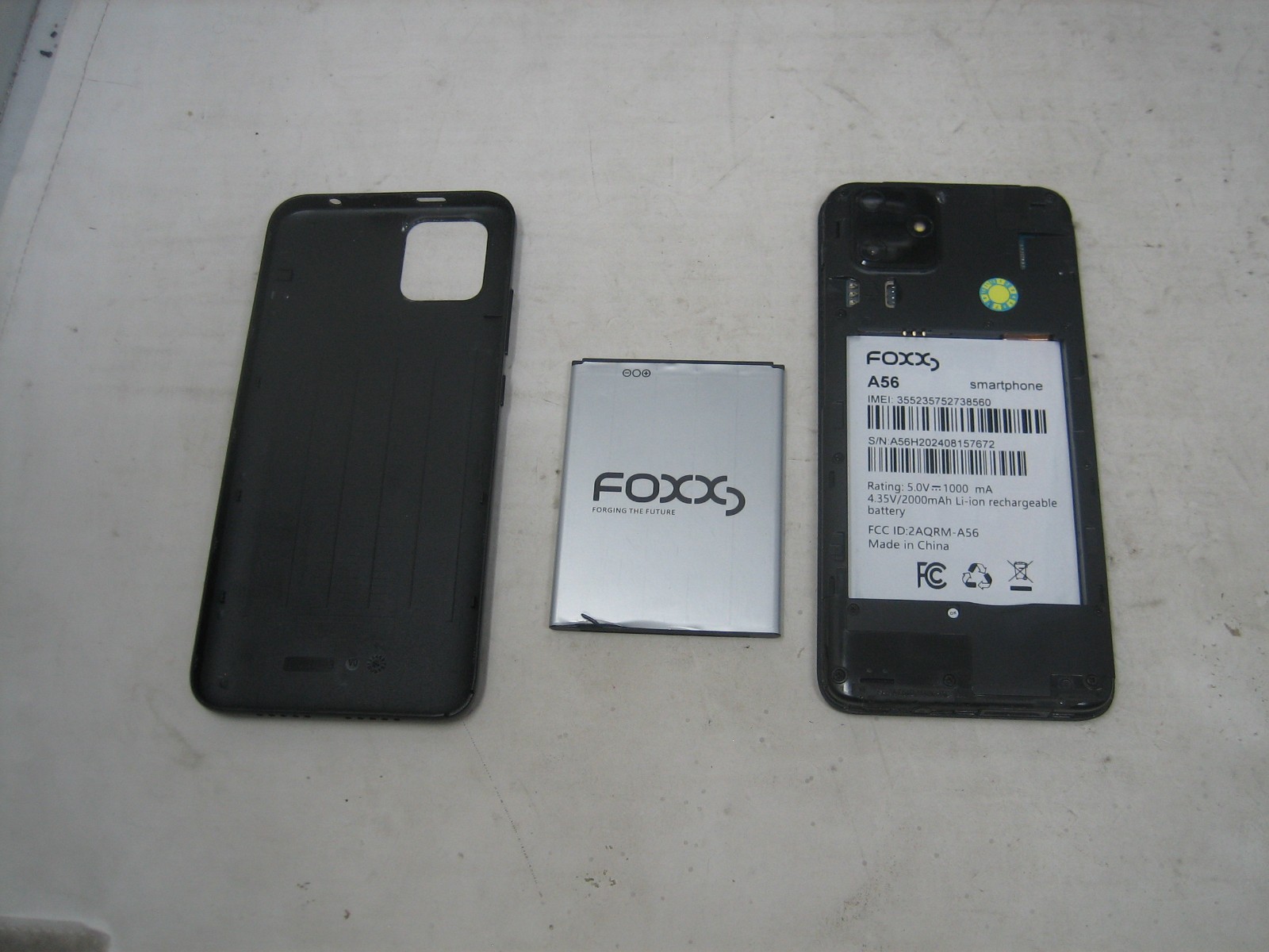 foxx a56 smartphone bad screen for parts only does turn on CELL PHONE