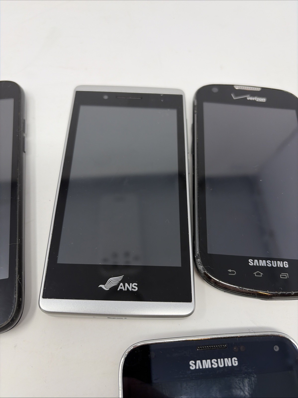 Lot of 7 Android / Windows Phones Untested For Parts / Repair