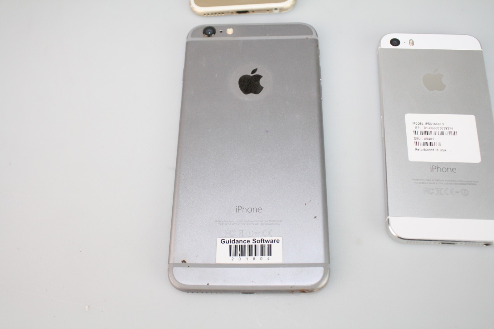 Lot of (4) iPhones A1633, A1522, A1533 – *FOR PARTS OR REPAIR*